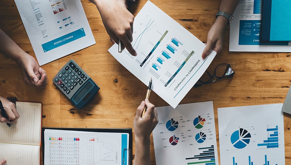 Finance team working around a table